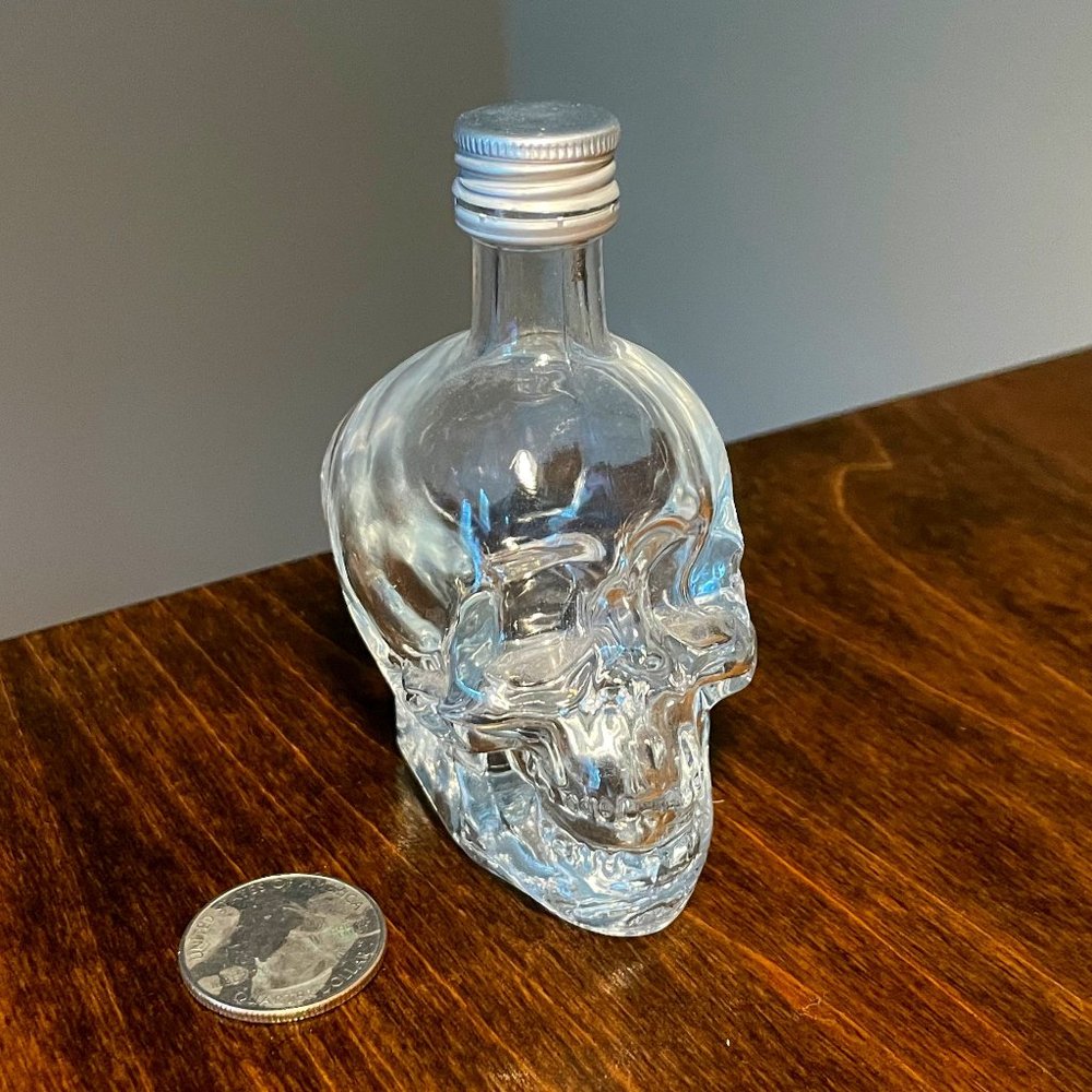 Tiny skull bud vase